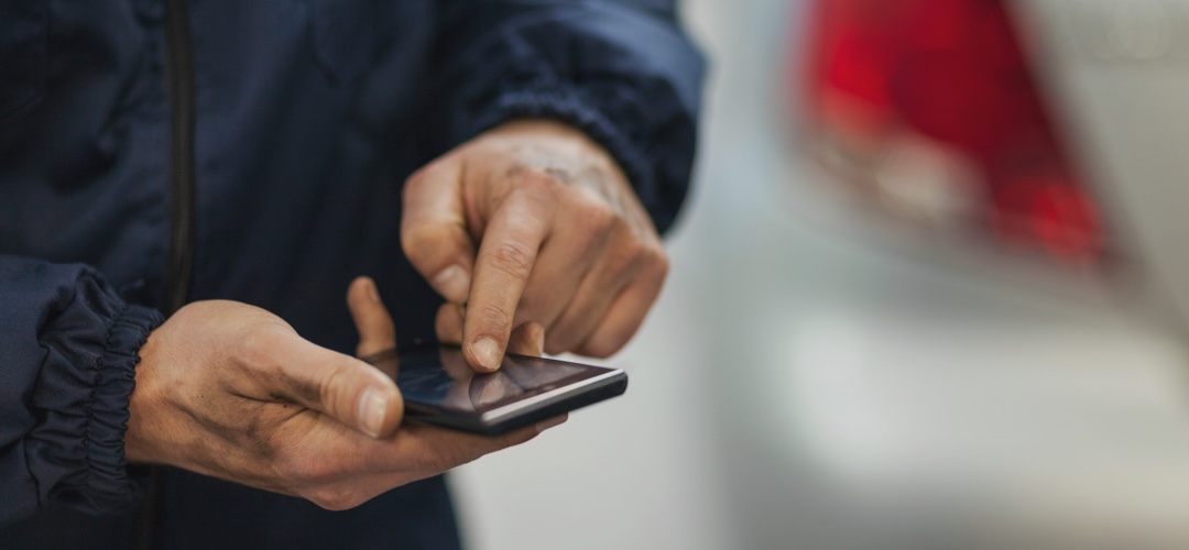 technician using a smartphone