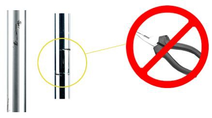 Use of unsuitable tools to hold the strut piston rod when tightening the top nut results in damage to the chromium surface of the piston rod and oil leakage