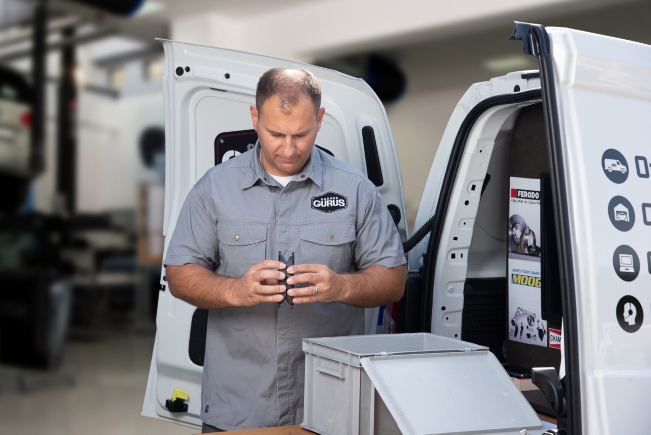 Garage Gurus checking brake pads for a warranty claim